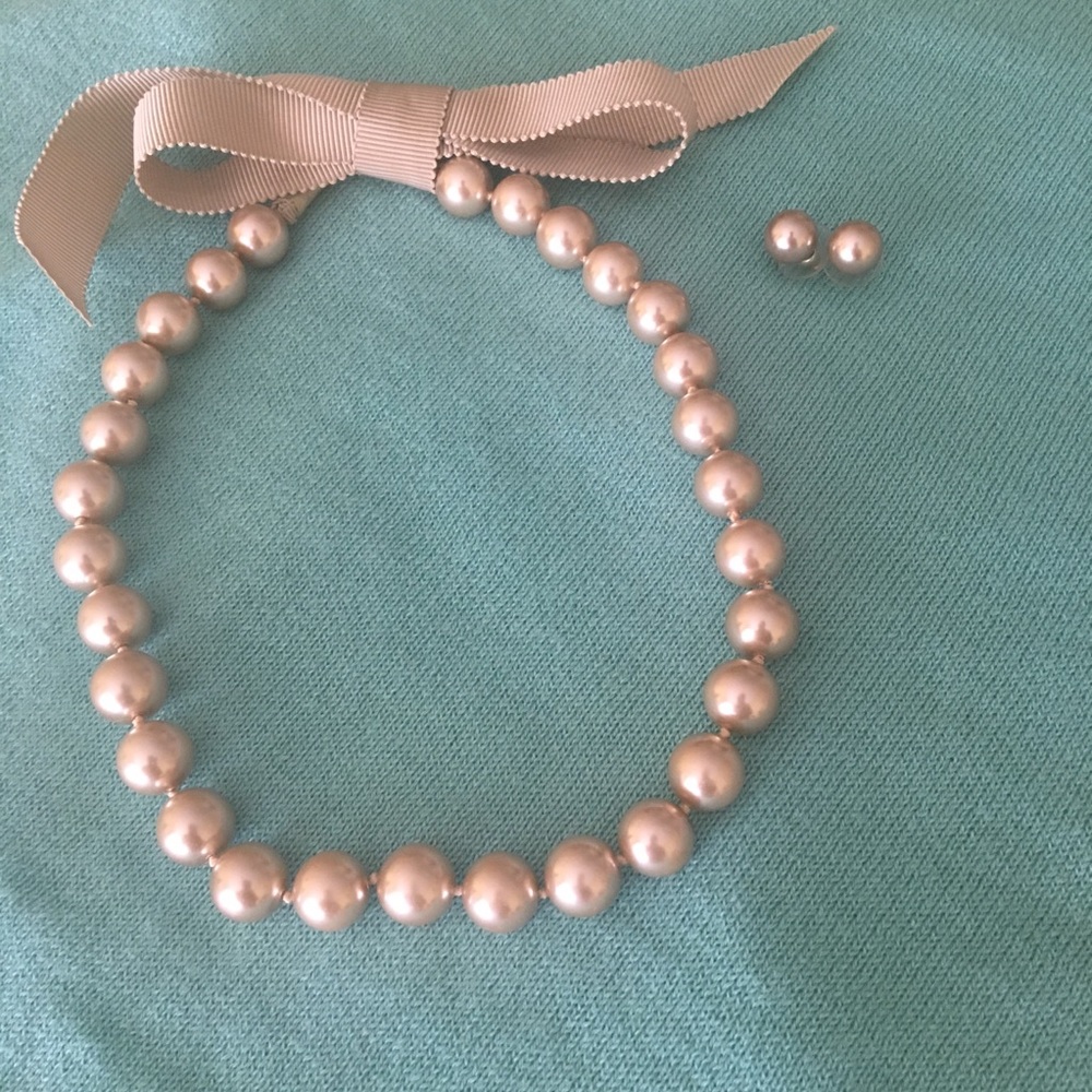 Pearl necklace and matching earrings set.